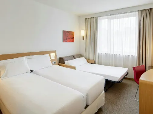 Habitaciones/Clásica Triple con camas individuales Habitaciones/Clásica Triple con camas individuales