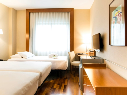 Habitaciones/Classic Twin con cama supletoria Habitaciones/Classic Twin con cama supletoria