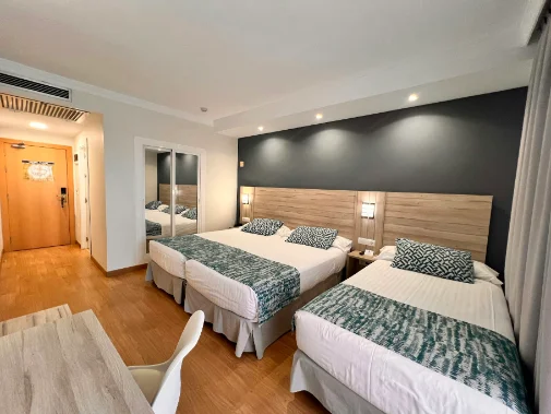 Habitaciones/Triple Room