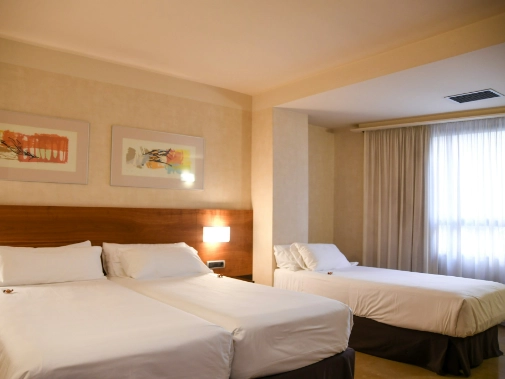 Habitaciones/Triple Room