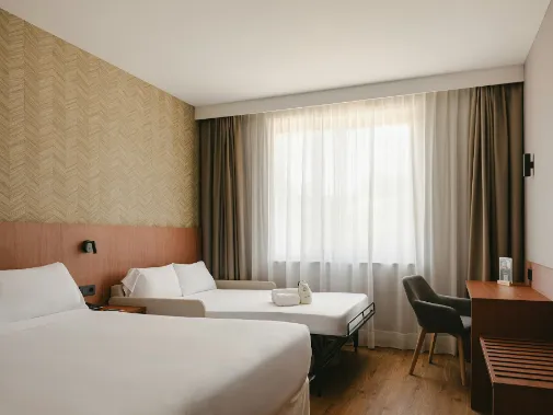 Habitaciones/Clásica Triple con camas individuales Habitaciones/Clásica Triple con camas individuales